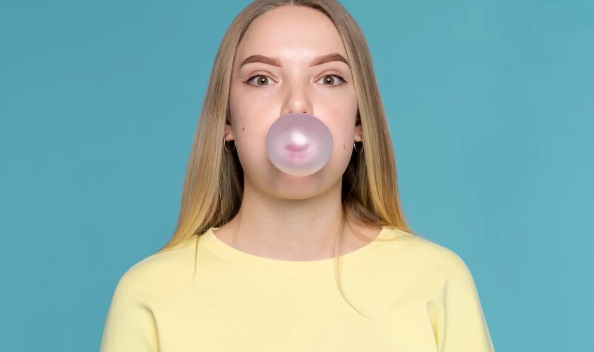 Portrait Teen Girl Making Balloon Out Gum 1170X694