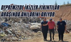 Yıkılan evlerinin enkazının taşındığı alanda anılarını arıyor!