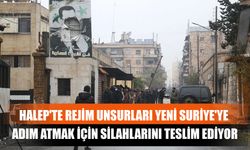 Halep'te Rejim Unsurları Yeni Suriye'ye Adım Atmak İçin Silahlarını Teslim Ediyor