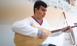 Taha'nın en büyük hayali görme engellilere bağlamasıyla konser vermek